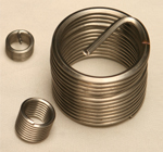 Helicoil wire thread inserts have an extensive background of tension, torque, shear, vibration and fatigue tests conducted by American