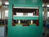 Frame type rubber plate vulcanizing machine