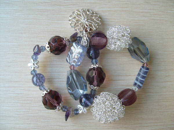 bracelet is made of glaze, glass beads,alloy with iron ball.