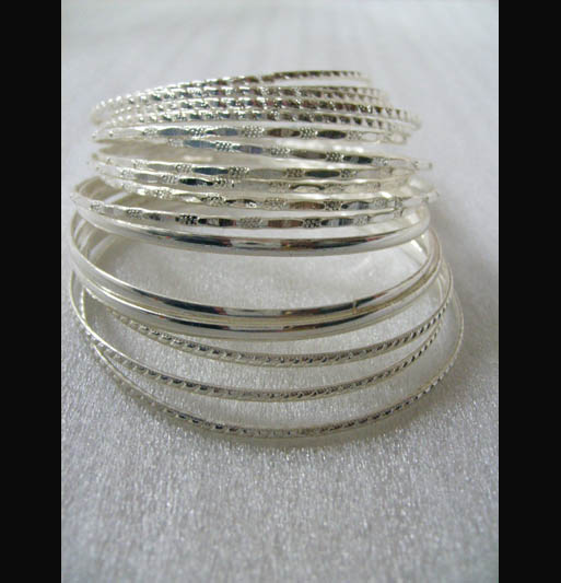 Bracelet is made of iron with shinny silver plating.