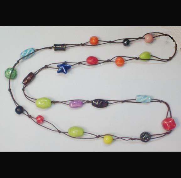 necklace is made of ceramic beads with wax string.